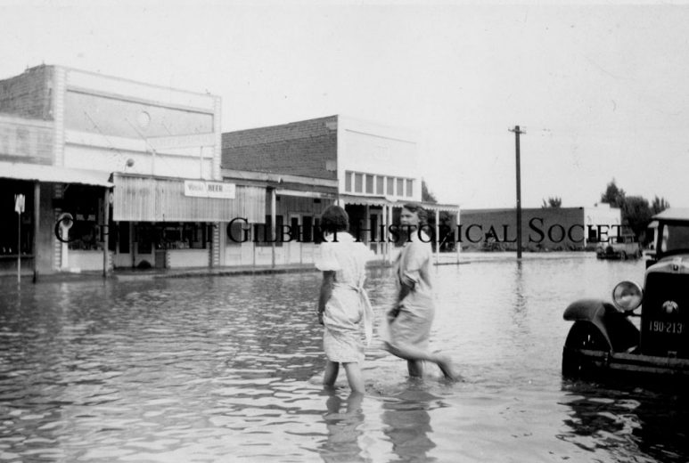 19 - Women Wading in flood water 1930s